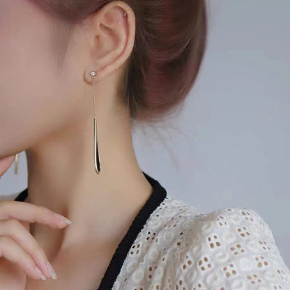 Boucles d’oreilles pendantes à franges noires