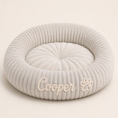 Round dog bed with a raised edge