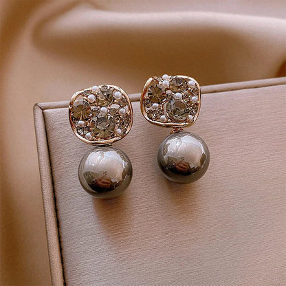 Boucles d’oreilles ornées de cristaux et de perles