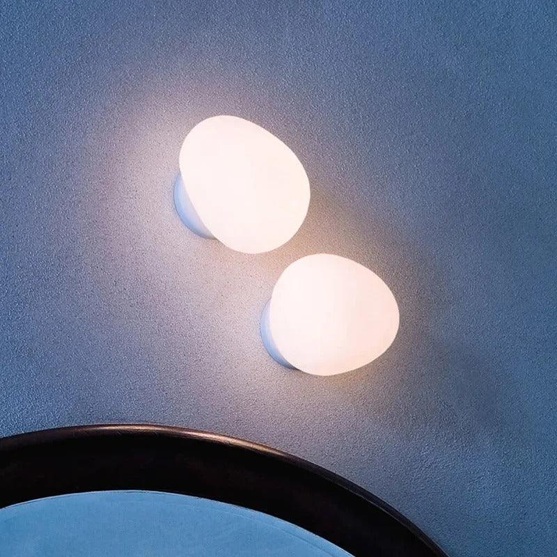 Egg-shaped wall lamp