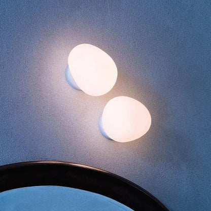 Egg-shaped wall lamp