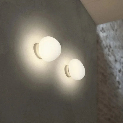 Egg-shaped wall lamp