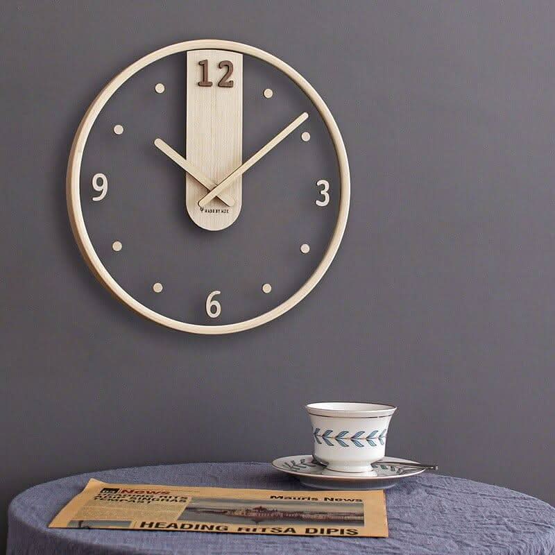 Horloge murale en métal et verre
