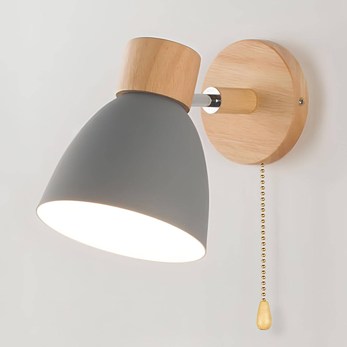 Wall light with a pull-cord switch