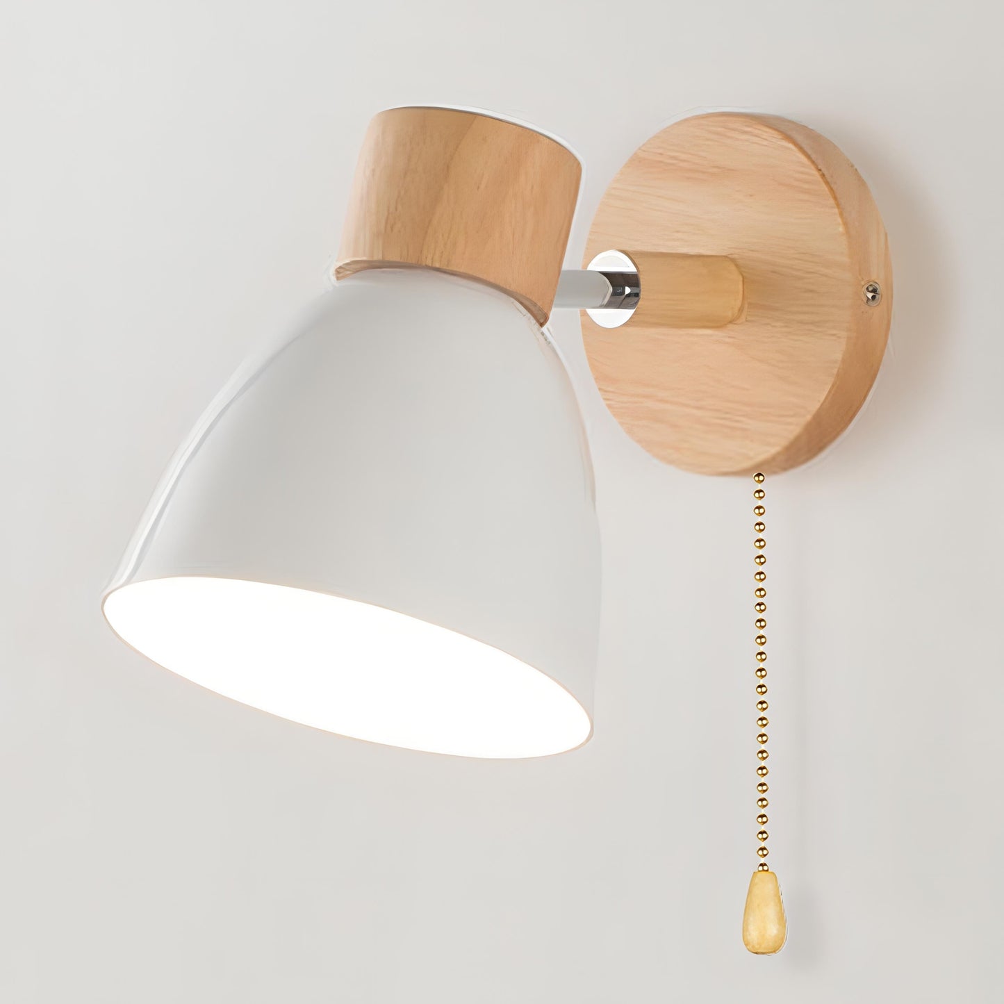 Wall light with a pull-cord switch