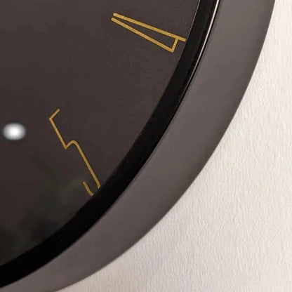 Black-and-gold wall clock, 35 cm