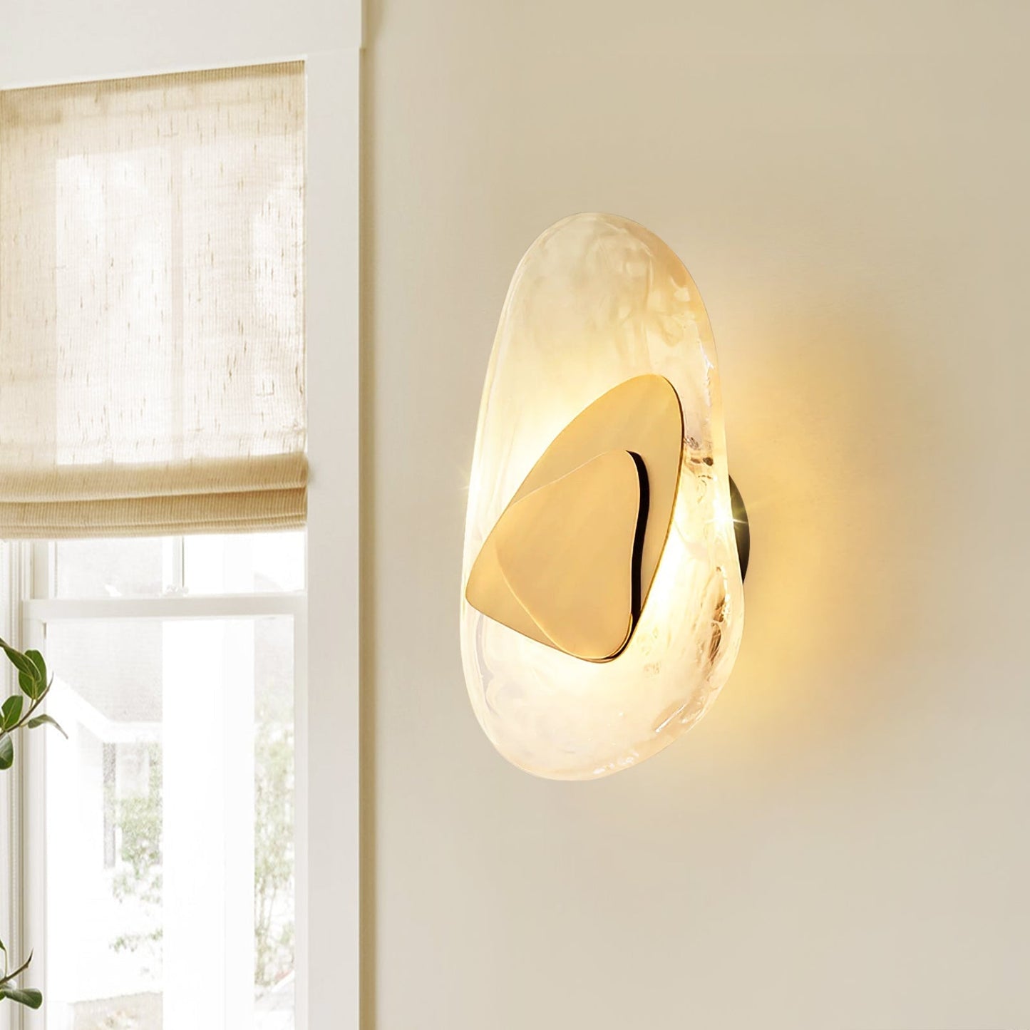 LED wall light with a glass shade