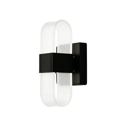 LED wall light with a ribbed shade