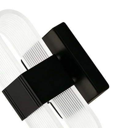 LED wall light with a ribbed shade
