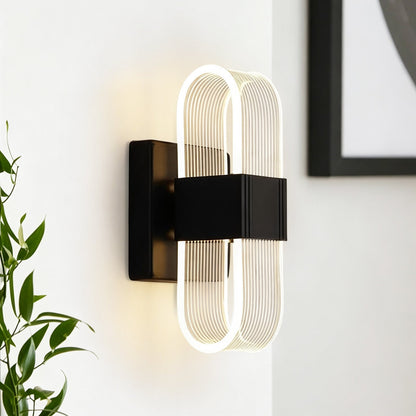 LED wall light with a ribbed shade