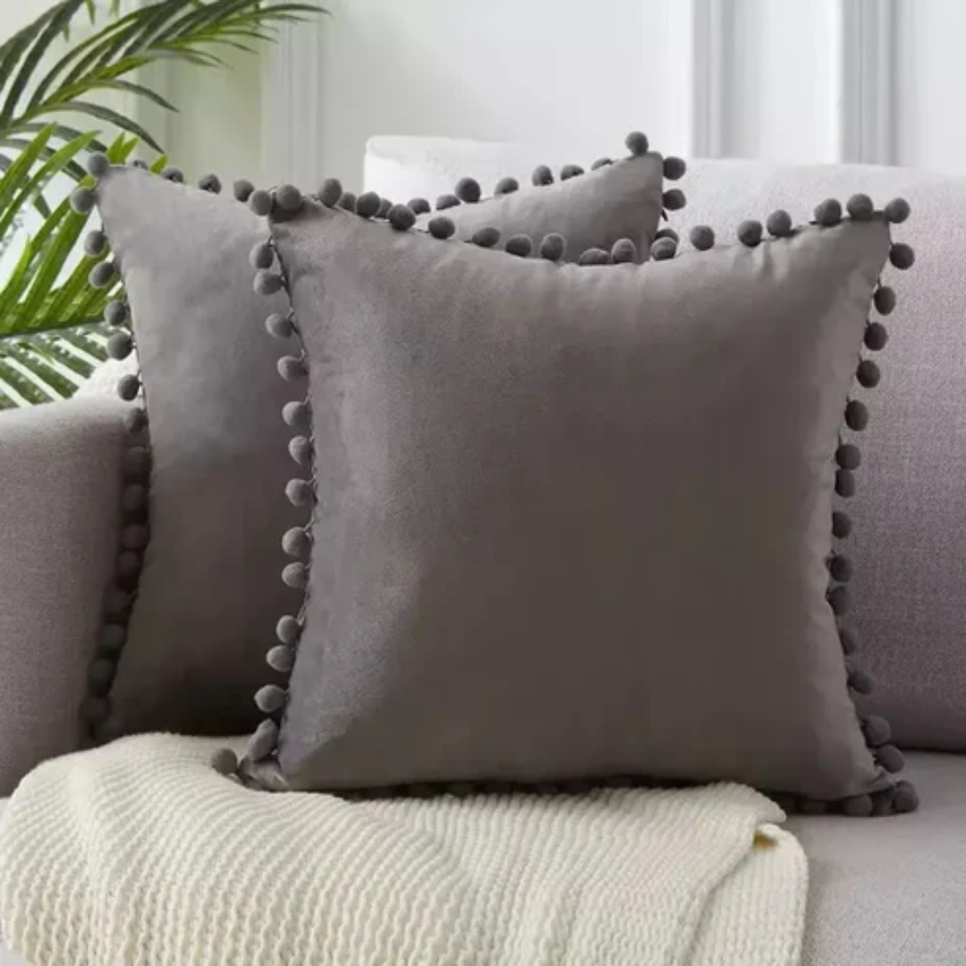 Pillowcase with pom-poms