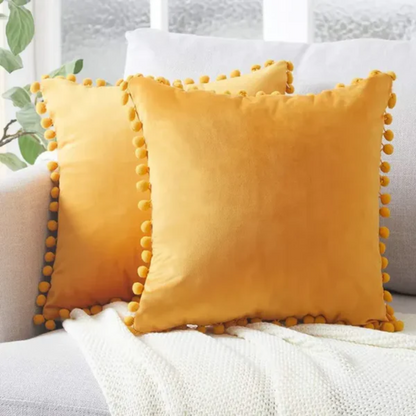 Pillowcase with pom-poms