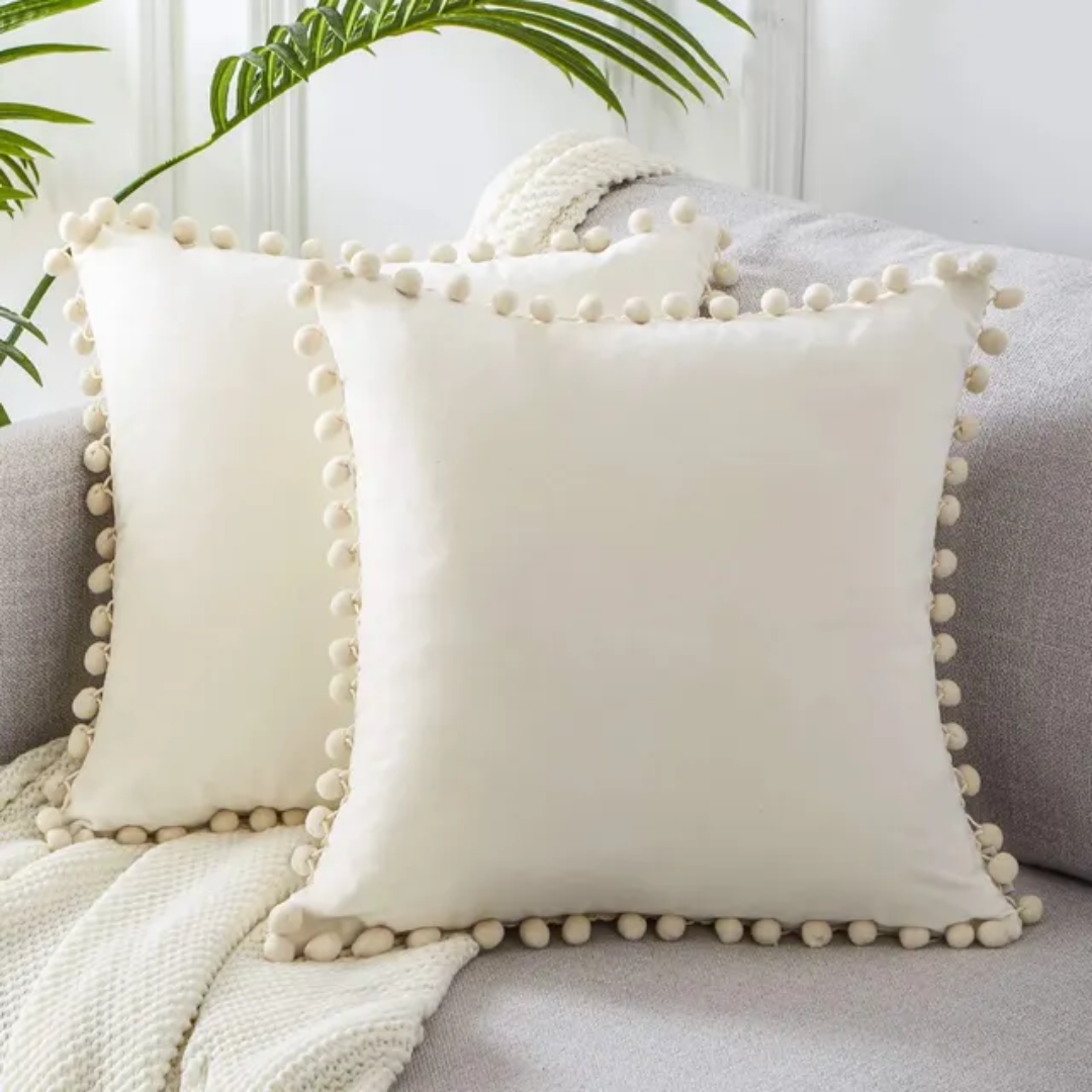 Pillowcase with pom-poms