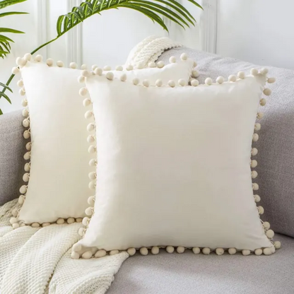 Pillowcase with pom-poms