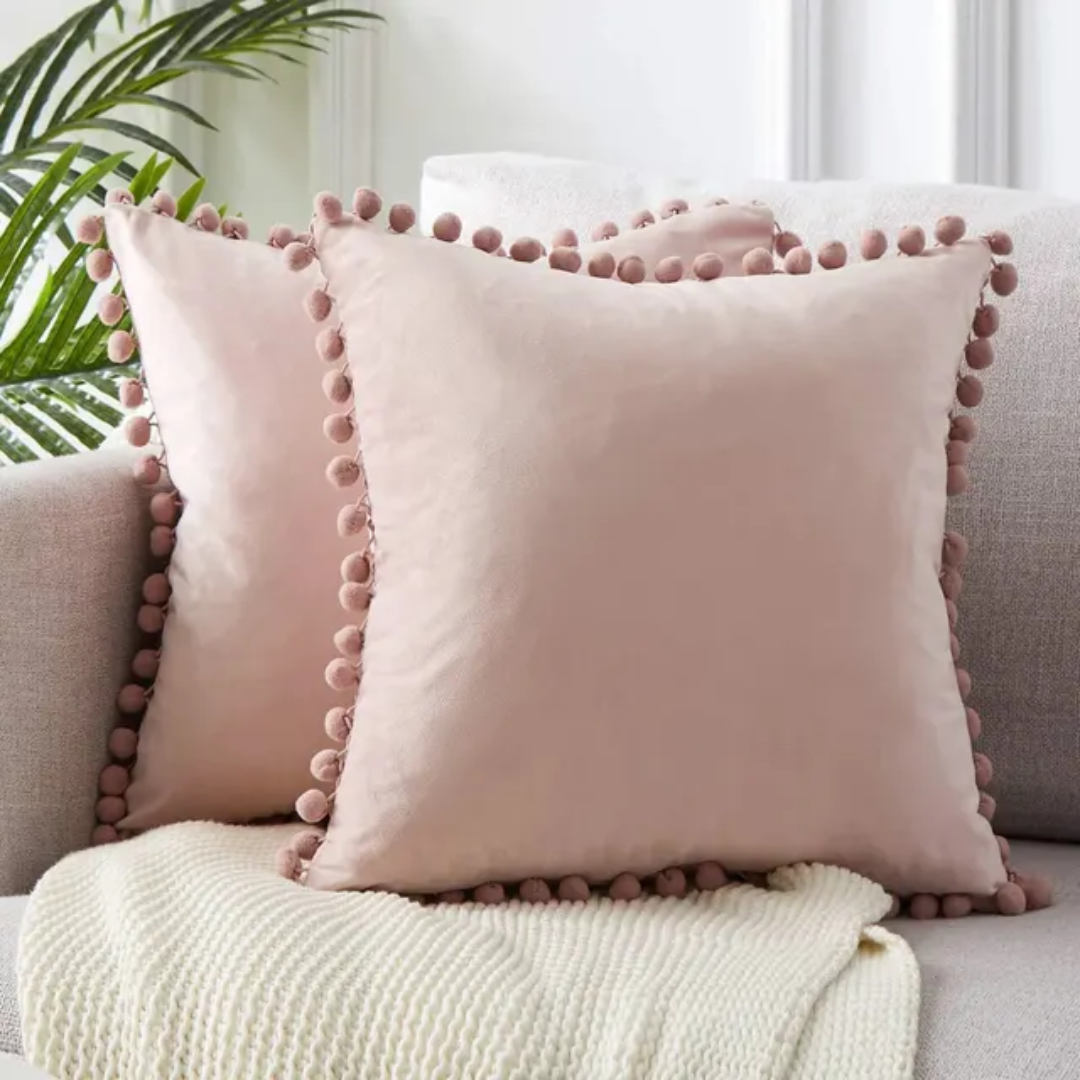 Pillowcase with pom-poms