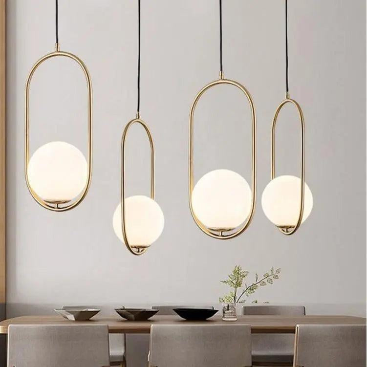 Oval pendant lamp with a globe