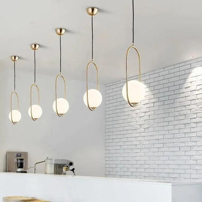 Oval pendant lamp with a globe