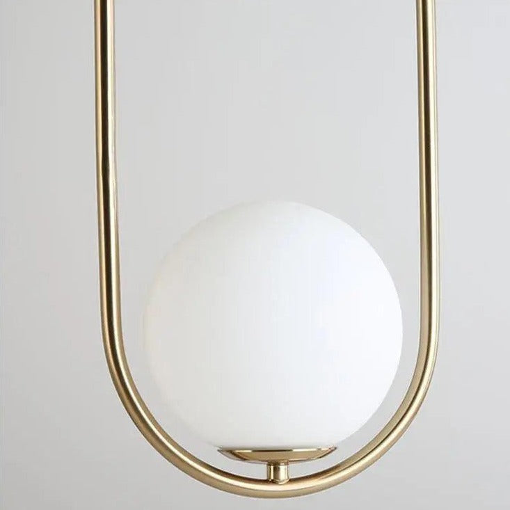 Oval pendant lamp with a globe