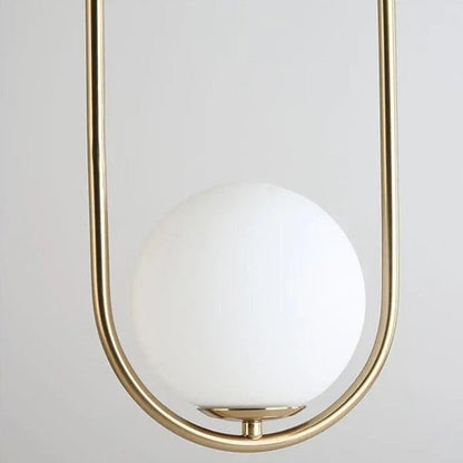 Oval pendant lamp with a globe