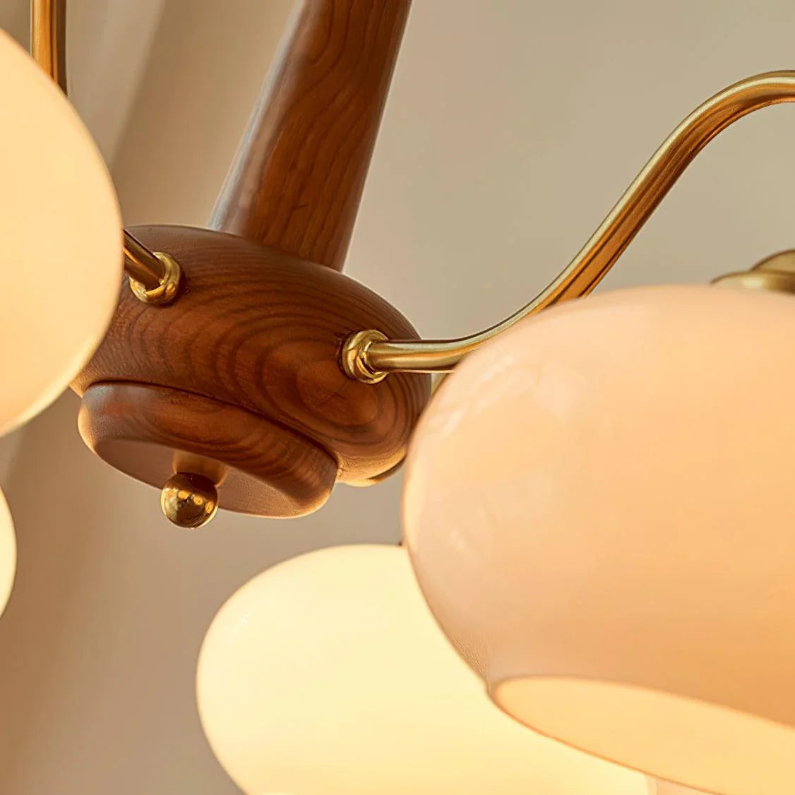 Wooden chandelier with glass shades