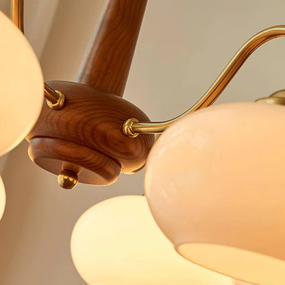 Wooden chandelier with glass shades
