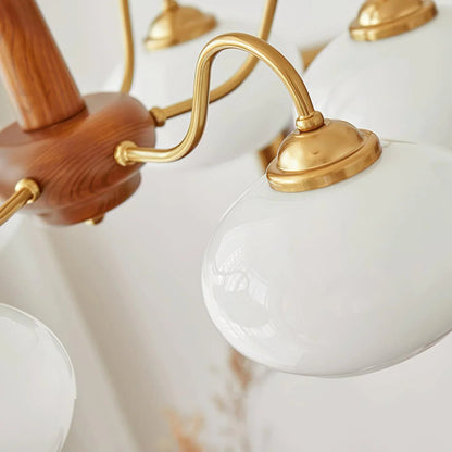 Wooden chandelier with glass shades